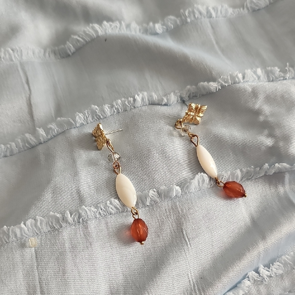 Elegant Gold and Cream Dangle Earrings